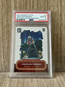 2024 Panini Donruss Optic #13 Uptowns Jonathon Brooks White Pandora /25 PSA 10 - Foto 1 di 2