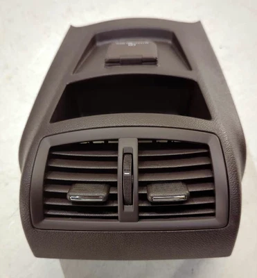 Nuevo registro de ventilación de aire de consola trasera original GM 2011-2017 Regal Cocoa 13270709 OEM Foto 1 de 4