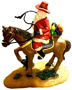 Weihnachtsmann 2009 zu Pferd mit Spielzeug Weihnachtsdorf Figur RAR - Bild 1 von 4