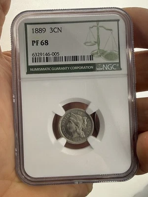 Никелевая монета 3 цента 1889 PR68 с зеленой этикеткой пруф NGC балансовая стоимость $8K!!!! - Изображение 1 из 4