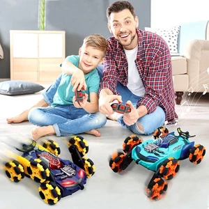Ferngesteuertes Auto 6 Räder 4WD RC Stunt Auto Spielzeug 360° Flip 2,4G Spray Autos Geschenk - Bild 1 von 10