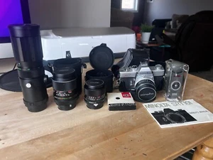 Minolta SR-T 101 35mm SLR Film Camera with multiple lenses - Picture 1 of 6