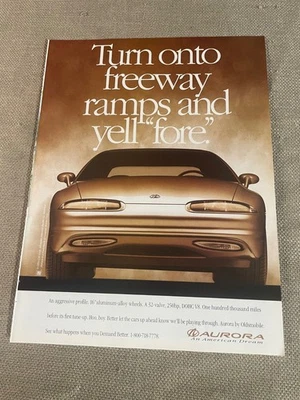 Oldsmobile Aurora Turn Onto Freeways and Yell Fore Magazine Advertisement 1994 - Image 1 of 2