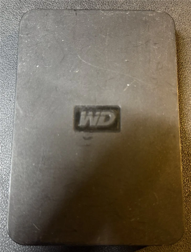 WD, 1 TB extern, P/N: WDBABBV0010BBK-00, S/N: Wx61A8030894, SATA HDD - Bild 1 von 3