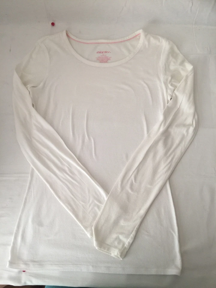 CAMISETA HILARATION NIÑA BLANCA CUELLO REDONDO MANGA LARGA Foto 1 de 3