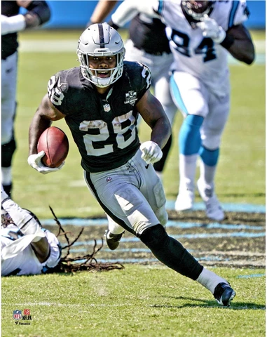 Josh Jacobs Las Vegas Raiders Unsigned First Las Vegas Win Vertical Cover