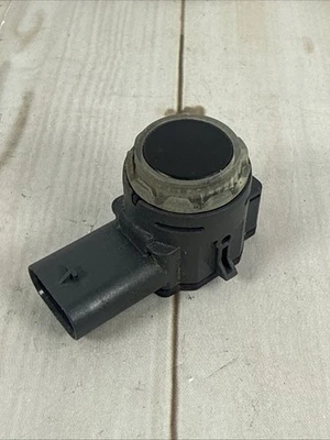 2021-2025 JAGUAR LAND ROVER ПЕРЕДНИЙ/ЗАДНИЙ БАМПЕР ДАТЧИК ПОМОЩИ ПРИ ПАРКОВКЕ ЧЕРНЫЙ ОТ ОРИГИНАЛЬНОГО ПРОИЗВОДИТЕЛЯ - Изображение 1 из 4