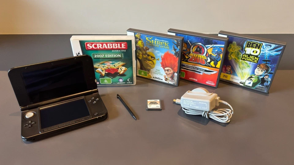 Nintendo 3DS XL Silver Console Bundle - incl 5 Games, Charger, SD Card & Stylus - image 1 of 4