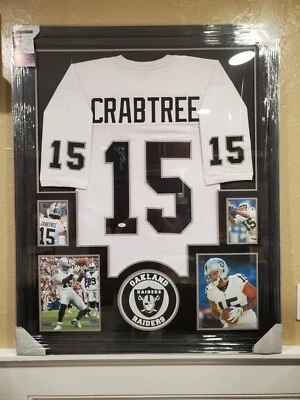 MICHAEL CRABTREE AUTOGRAPHED RAIDERS JERSEY FRAMED. JSA COA  - Image 1 of 3