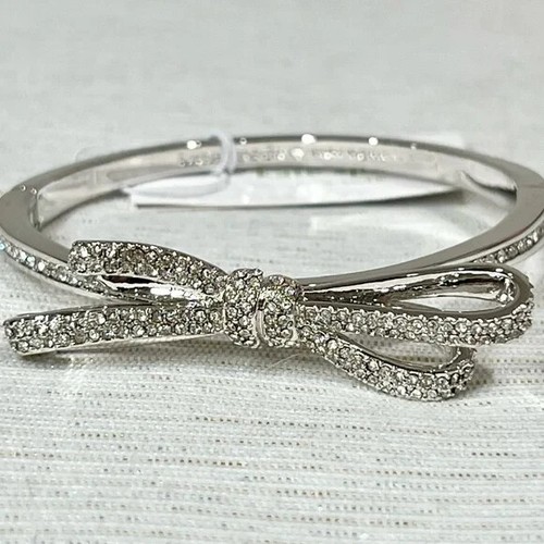 Nuovo con etichette Bracciale Kate Spade NY tono argento pavè legato fiocco