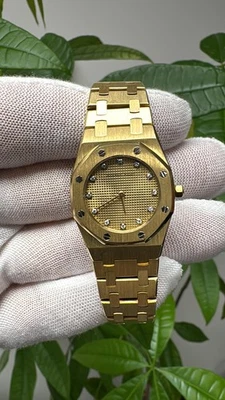 Reloj para dama Audemars Piguet-Roble real esfera de diamantes champán oro amarillo de 18 quilates Foto 1 de 4
