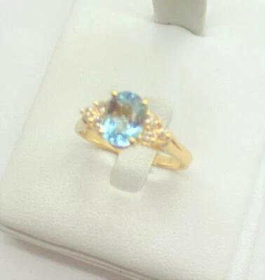 Anillo de diamantes y aguamarina de corte ovalado de oro amarillo de 14 quilates 4 gramos talla 10,5 Foto 1 de 4
