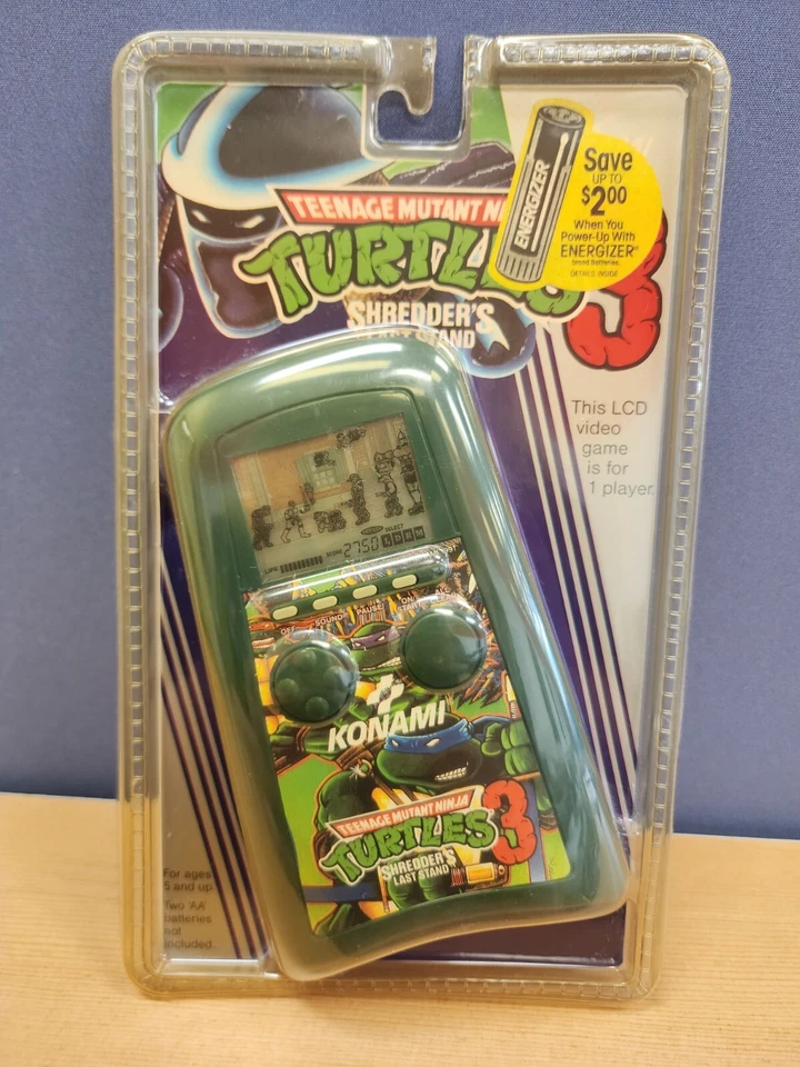 Teenage Mutant Ninja Turtles 3 Trituradoras Último Soporte Juego Electrónico Portátil NUEVO Foto 1 de 4