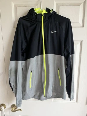 Chaqueta reflectante Nike grande para hombre con escudo para correr 553680-010 Foto 1 de 4