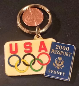 2000 SYDNEY OLYMPICS LARGE KEY RING - PASSPORT  w/TEAM USA OLYMPIC RINGS - Picture 1 of 1