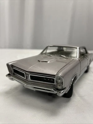 Pontiac GTO 1965 fundido a presión escala 1:24 Danbury como nuevo sin caja/suelto dañado ver fotos Foto 1 de 4