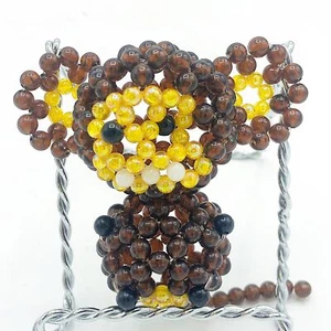 Affe Perlenfigur gelb und braun - Bild 1 von 5