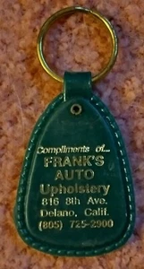 Vintage FRANK'S AUTO UPHOLSTERY Keychain Delano California Plastic Green & Gold - Picture 1 of 2