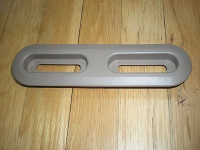 NOS 1987 1988 FORD AEROSTAR FRONT SEAT BELT SHIELD REAR CHESTNUT - Image 1 of 3