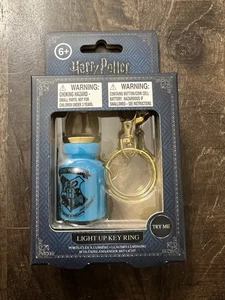 New Harry Potter Hogwarts Potion Bottle Light Up Key Chain - Picture 1 of 3