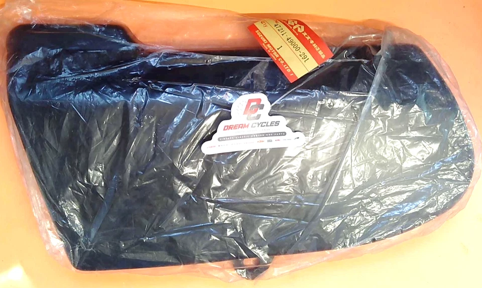 CUBIERTA LATERAL NUEVA GENUINA SUZUKI GS1000 1978-80 LH 47211-49000-291 ENVÍO RÁPIDO Foto 1 de 1