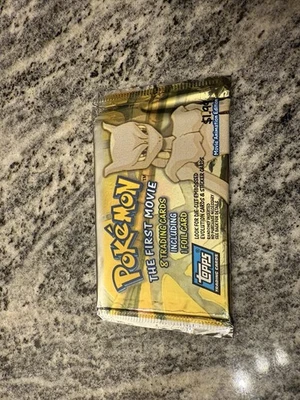 Pokémon La Primera Película Pack Sin Abrir. ¡Incluye una tarjeta de aluminio! Foto 1 de 3