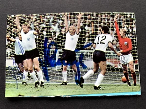 BOBBY MOORE-SCHNELLINGER-HELD signed Poly-Sammelbild Autogramm - Picture 1 of 1