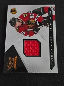 2010-11 PANINI LUXURY SUITE PATRICK KANE #15 #ed 366/599 JERSEY - Picture 1 of 2