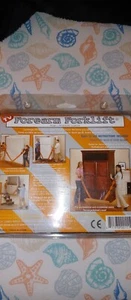 Orange Unterarmstapler - Bild 1 von 3