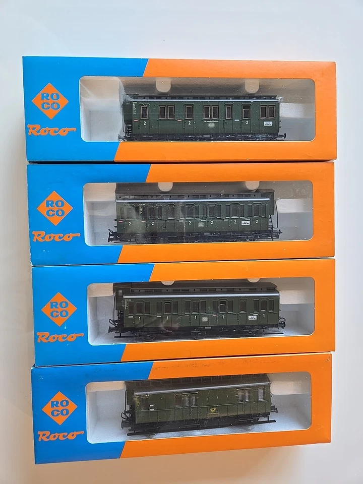 Paquete Roco; 44205A, 44206A, 45207A y 44208A; 3 vagones autocares y 1 coche postal Foto 1 de 3