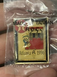 Texaco 1996 Atlanta VTG Olympic Izzy Game Pinback Lapel Hat Cap Pin 92 ACOG NEW - Picture 1 of 2
