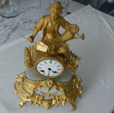 Ancienne pendule horloge en régule doré MOUREY & COUENNE - Photo 1/4