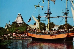 Vintage Postcard Disneyland Frontierland Columbia Ship Matterhorn in background - Picture 1 of 3