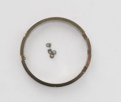 Anillo espaciador de movimiento triple fecha Valjoux 730 Wakmann genuino con tornillos Foto 1 de 2