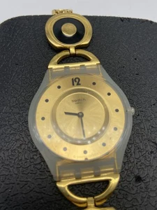 Women's Swatch Swiss Made 34mm Case Caring Swing Bracelet Stainless Steel Watch - Picture 1 of 4