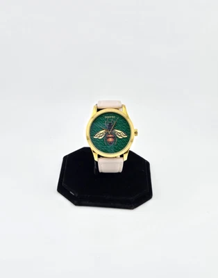 Reloj Gucci G-Timeless para mujer esfera verde esmeralda correa de cuero - YA1264065 Foto 1 de 4