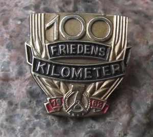 1962 NAW Nationale Bauswerk RDT Germania fronte nazionale 100 km spilla distintivo - Foto 1 di 2