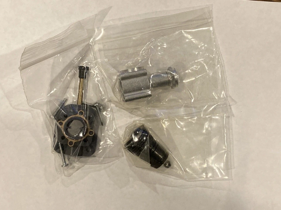 COX .049 AIRPLANE ENGINE PARTS - NEW IN PACKAGE - Image 1 of 1