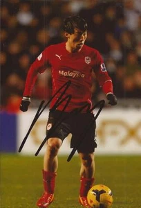 CARDIFF: KIM BO-KYUNG SIGNED 6x4 ACTION PHOTO+COA - Picture 1 of 1