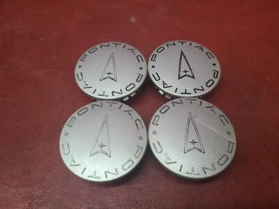 Tapacubos centrales Pontiac G5 G6 Vibe Grand Prix Am 1996-2011 muchos más Foto 1 de 4