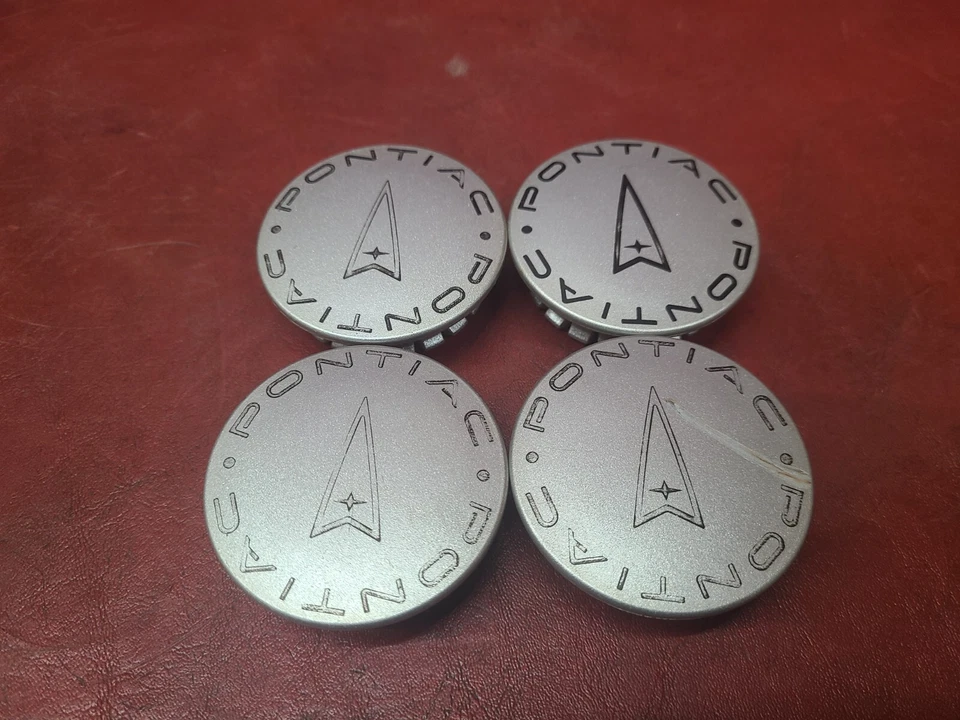 Tapacubos centrales Pontiac G5 G6 Vibe Grand Prix Am 1996-2011 muchos más Foto 1 de 4