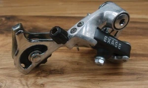 Deragliatore posteriore 1992 Shimano Exage RD-M320 VIA Japan gabbia lunga 7 velocità - Foto 1 di 8