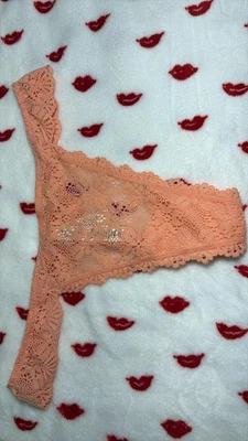 Bragas de tanga de encaje naranja de Victoria's Secret Talla M NWT Foto 1 de 3