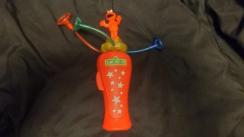 Sesame Street Live Elmo Electronic Light-Up Spinner Toy 2007 Cover