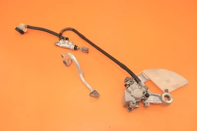 2001 01-03 RM125 RM 125 OEM Pinza de freno trasera Soporte Cilindro maestro Brazo de palanca Foto 1 de 4