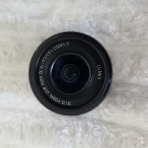 Objectif Panasonic Lumix G Vario 12-32mm F4-5.6 ASPH - Bon état (petit choc) - Photo 1/5