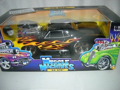 1966 Pontiac GTO in Black with Flames new in box 1:18 scale  Muscle Machine - Image 1 of 3