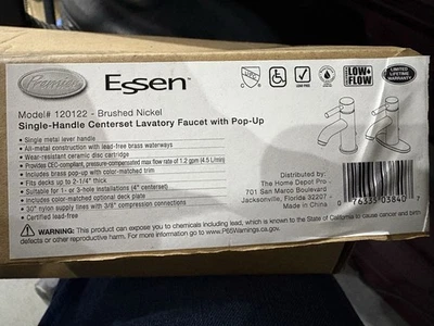 Grifo mezclador de una manija para lavabo de baño de níquel cepillado con desagüe emergente Foto 1 de 2