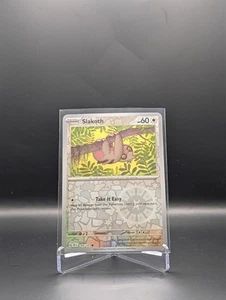 Slakoth 145/191 Surging Sparks ¡Holo inverso común! - Imagen 1 de 2