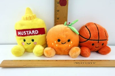 Lot of 3 Aurora Palm Pals Beanbag Plush 4" Newton Mustard, Tangie Orange & Hoops - Image 1 of 4